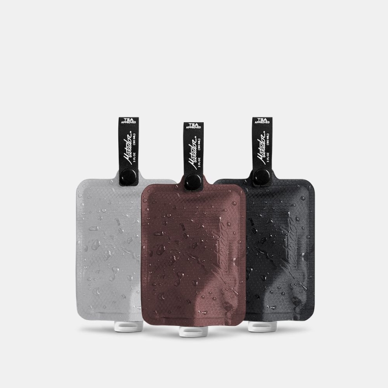 Matador Matador FlatPak Toiletry Bottle 3-Pack Charcoal, White, Garnet