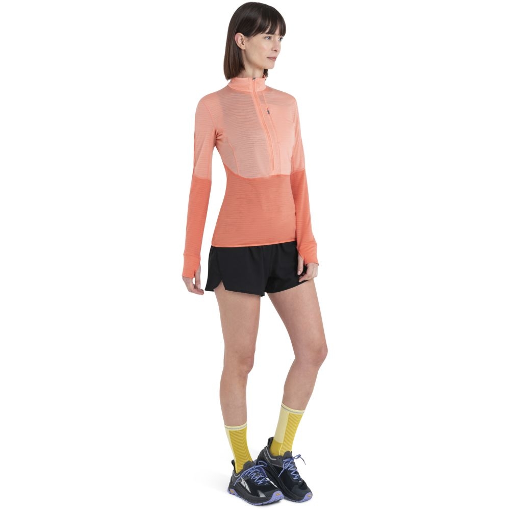 Icebreaker Merino 200 Realfleece Descender LS Half Zip Women' Glow/Tang/Cb 0A56YMC-961 fleeces en truien online bestellen bij Kathmandu Outdoor & Travel