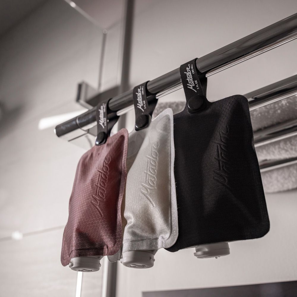 Matador Matador FlatPak Toiletry Bottle 3-Pack Charcoal, White, Garnet MATFPB3001MLT2 toiletartikelen online bestellen bij Kathmandu Outdoor & Travel