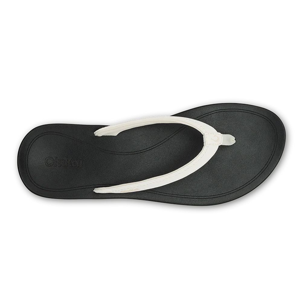 Olukai Uiki Bright White/Lava Rock 20537-WBLR slippers online bestellen bij Kathmandu Outdoor & Travel